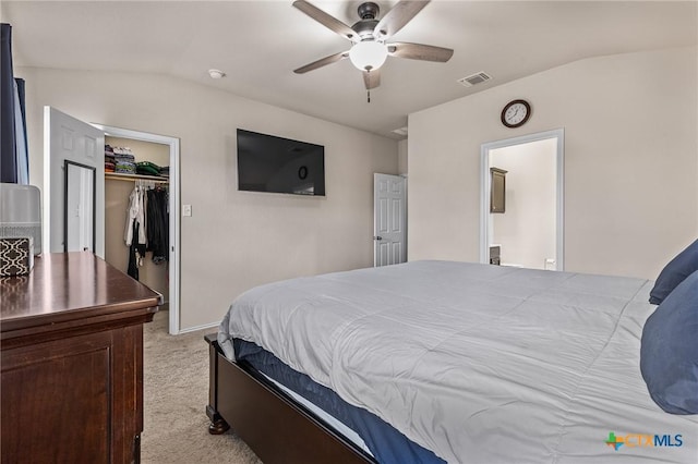 853 Hobby Rd, Copperas Cove, TX 76522 - bedroom with light carpet, lofted ceiling, a walk in closet, a closet, and ceiling fan