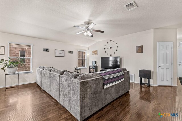 853 Hobby Rd, Copperas Cove, TX 76522 - living area featuring ceiling fan, dark wood-style flooring, a textured ceiling, and baseboards