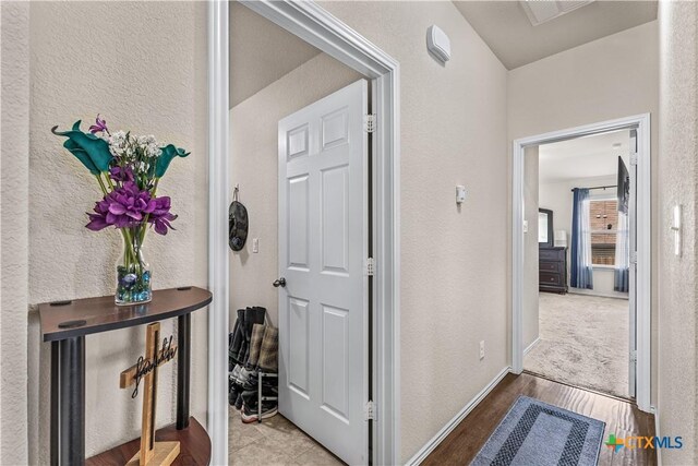 853 Hobby Rd, Copperas Cove, TX 76522 - hall featuring a textured wall and wood finished floors