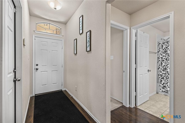 853 Hobby Rd, Copperas Cove, TX 76522 - foyer entrance with wood finished floors and baseboards