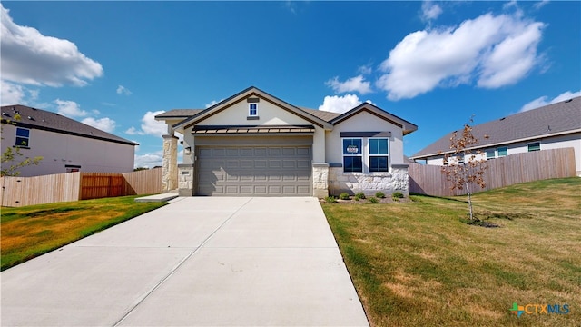 single story home featuring concrete driveway, stone siding, fence, a front yard, and stucco siding