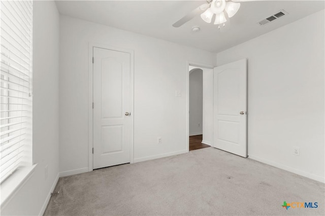 3511 Llano Estacado Ct, Killeen, TX 76549 - unfurnished bedroom featuring carpet flooring, baseboards, and ceiling fan