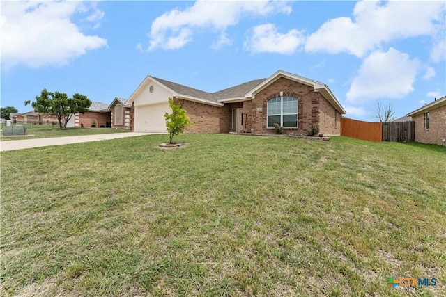 3511 Llano Estacado Ct, Killeen, TX 76549 - single story home with brick siding, concrete driveway, and an attached garage