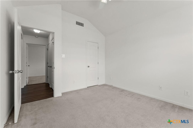 3511 Llano Estacado Ct, Killeen, TX 76549 - unfurnished bedroom with light carpet, lofted ceiling, baseboards, and ceiling fan
