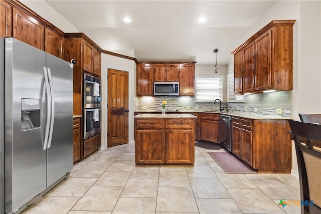2034 Falling Leaf Ln, Harker Heights, TX 76548 - kitchen featuring a sink, appliances with stainless steel finishes, decorative backsplash, and a kitchen island