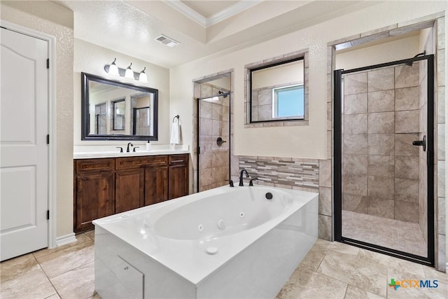2034 Falling Leaf Ln, Harker Heights, TX 76548 - bathroom with ornamental molding, a shower stall, and visible vents
