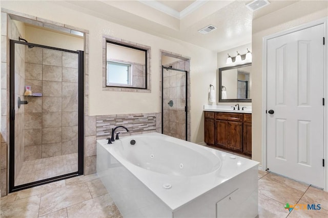 2034 Falling Leaf Ln, Harker Heights, TX 76548 - full bath featuring visible vents, ornamental molding, vanity, a tub with jets, and a stall shower