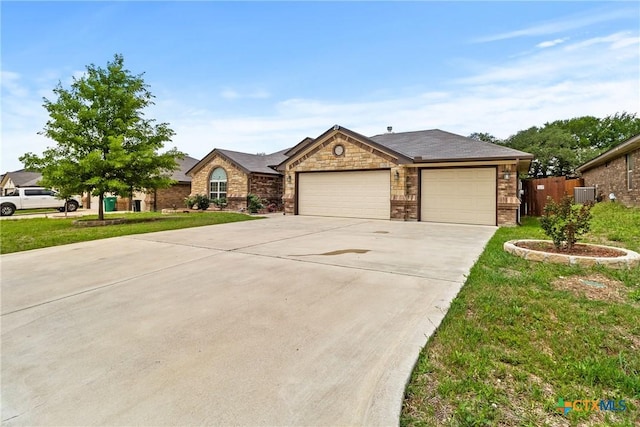 2034 Falling Leaf Ln, Harker Heights, TX 76548 - view of front of property featuring fence, a front yard, brick siding, concrete driveway, and an attached garage