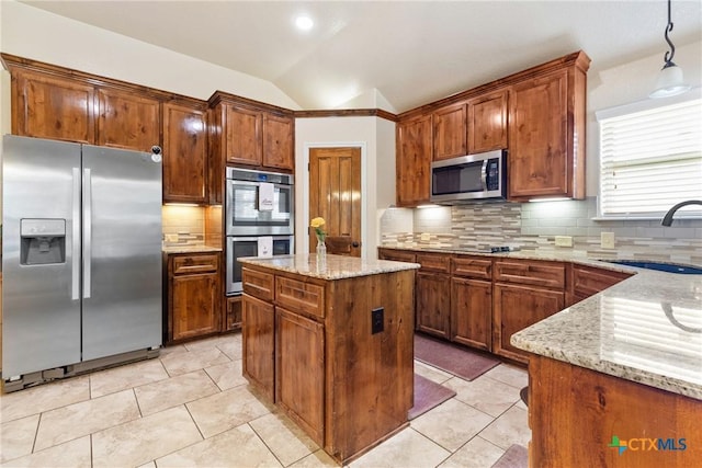 2034 Falling Leaf Ln, Harker Heights, TX 76548 - kitchen with light stone counters, a sink, stainless steel appliances, lofted ceiling, and tasteful backsplash