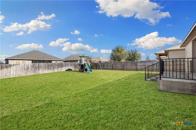 view of yard with a playground