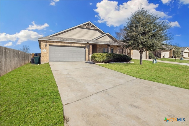 view of front of house featuring a front yard and a garage