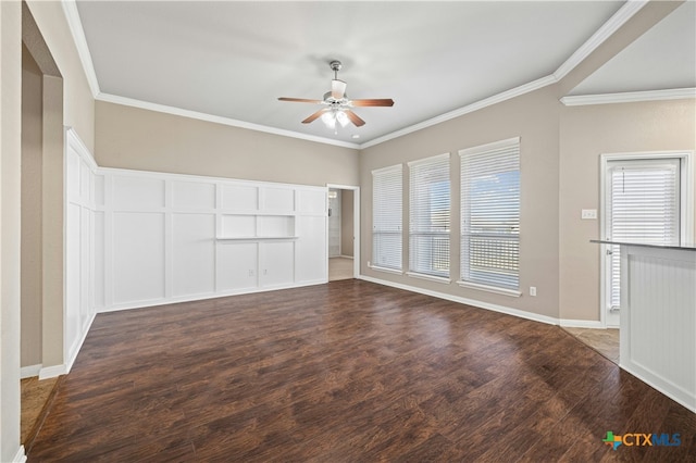 unfurnished living room featuring dark hardwood / wood-style flooring, ceiling fan, and crown molding