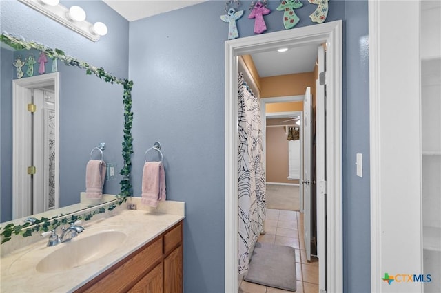 bathroom with vanity and tile patterned floors