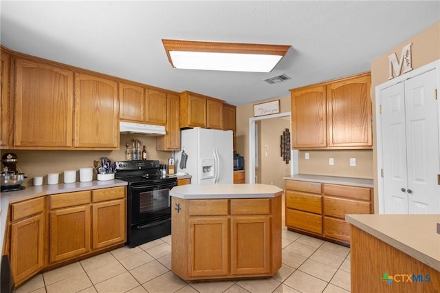 kitchen featuring black / electric stove, light tile patterned flooring, white fridge with ice dispenser, and a center island