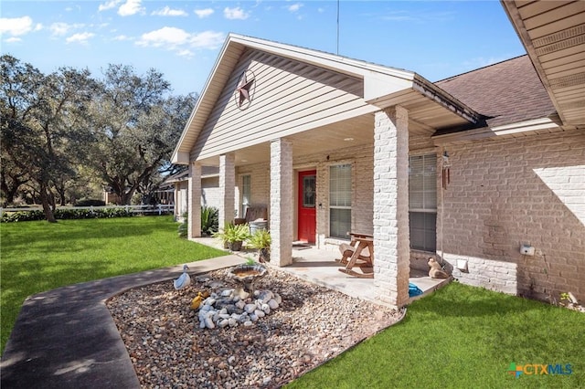 exterior space with a yard and a patio area