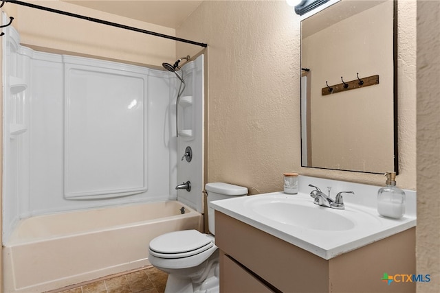 full bathroom featuring toilet, shower / bathtub combination, and vanity