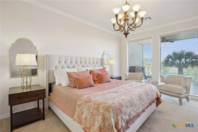 carpeted bedroom featuring ornamental molding and an inviting chandelier