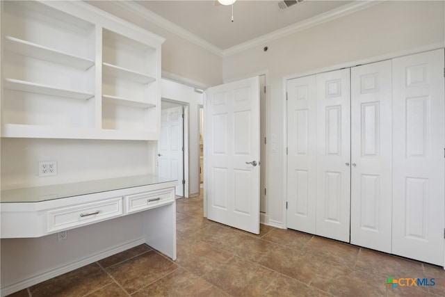 interior space featuring crown molding, tile patterned flooring, and ceiling fan