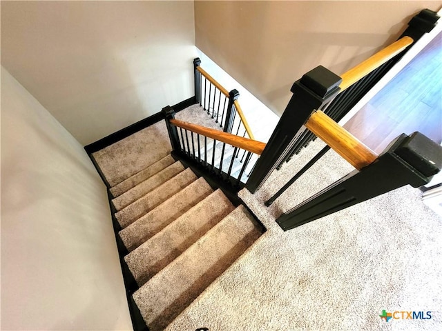 stairway with baseboards