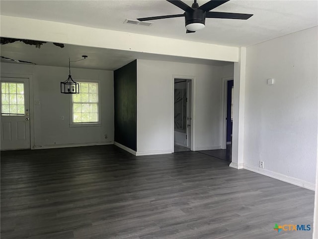 1601 S 35th St, Temple, TX 76504 - empty room with a ceiling fan and dark wood-type flooring