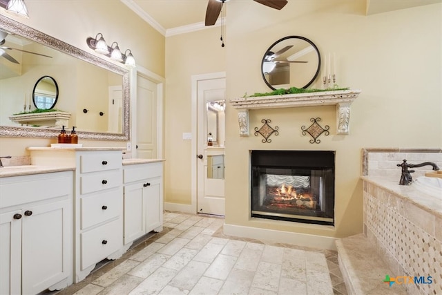 bathroom featuring vanity, a multi sided fireplace, and ornamental molding