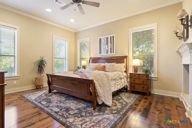 bedroom featuring ceiling fan, crown molding, dark wood-type flooring, and multiple windows