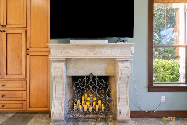 interior details with a high end fireplace