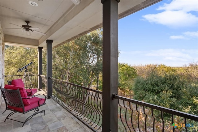 balcony featuring ceiling fan