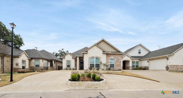 view of front of home with brick siding and driveway