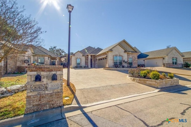 view of front of property featuring a garage