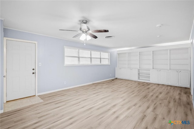 interior space with ceiling fan, light hardwood / wood-style flooring, and crown molding