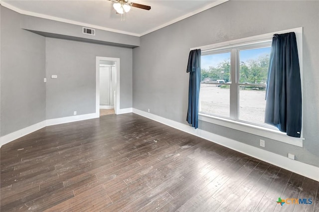 214 Hubbard St, Yoakum, TX 77995 - empty room with ceiling fan, ornamental molding, wood finished floors, and baseboards
