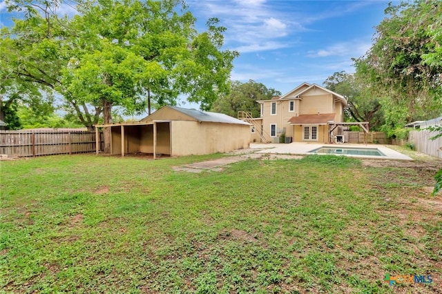 214 Hubbard St, Yoakum, TX 77995 - view of yard with a patio