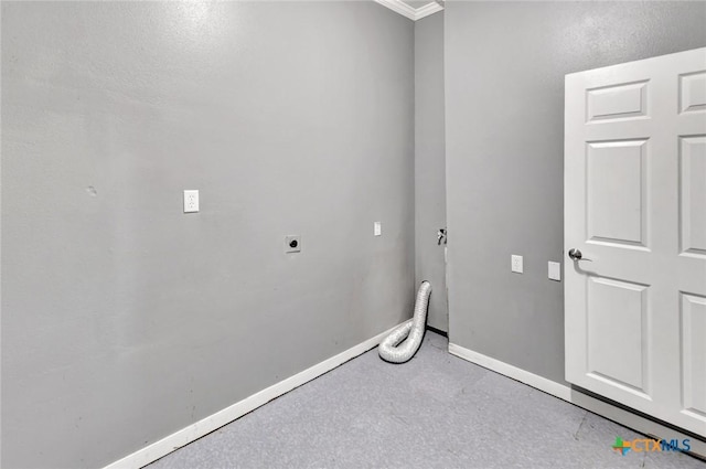 214 Hubbard St, Yoakum, TX 77995 - washroom featuring electric dryer hookup, crown molding, and baseboards