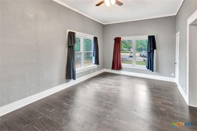 214 Hubbard St, Yoakum, TX 77995 - spare room featuring ceiling fan, baseboards, wood finished floors, and ornamental molding