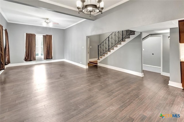 214 Hubbard St, Yoakum, TX 77995 - unfurnished living room with a chandelier, stairs, ornamental molding, dark wood finished floors, and a ceiling fan