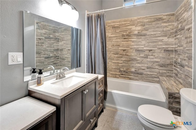 214 Hubbard St, Yoakum, TX 77995 - bathroom with toilet, vanity, and shower / bath combo with shower curtain