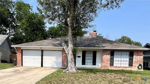 6430 Ridge Village Dr, San Antonio, TX 78233 - ranch-style home featuring an attached garage, driveway, brick siding, a chimney, and a shingled roof
