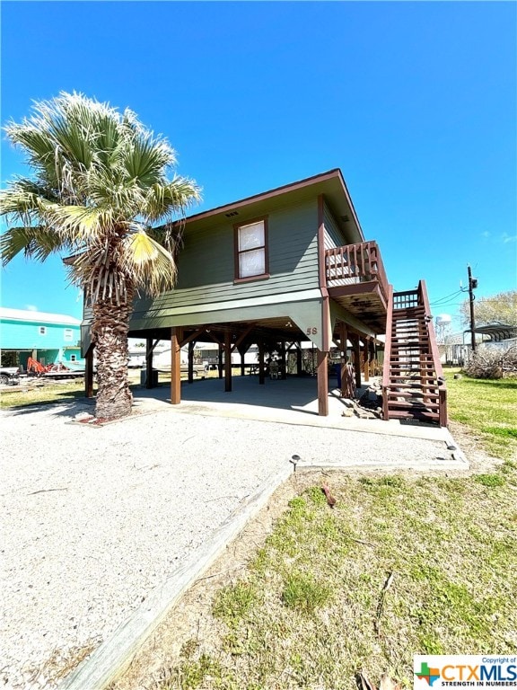 view of property exterior featuring a carport