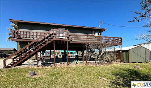 back of property featuring a lawn and a deck