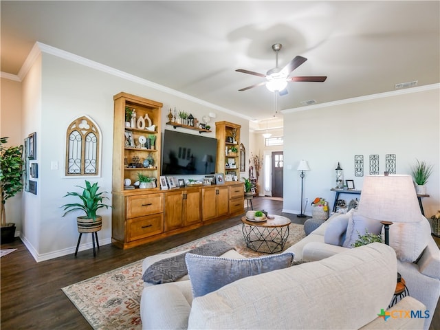 living room featuring dark wood-type flooring, ceiling fan, and crown molding