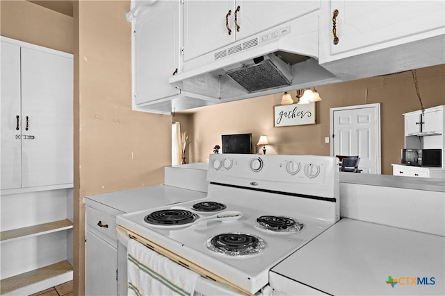 1400 Barbara Ln, Killeen, TX 76549 - kitchen with white electric range oven, under cabinet range hood, light countertops, and white cabinets