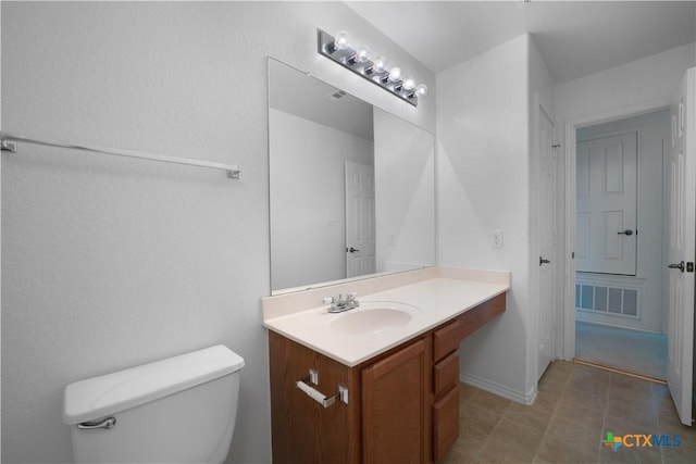 180 Beech Dr, Kyle, TX 78640 - bathroom featuring toilet and vanity