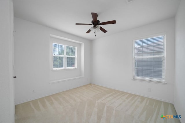180 Beech Dr, Kyle, TX 78640 - empty room with carpet floors and ceiling fan