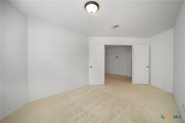 180 Beech Dr, Kyle, TX 78640 - empty room with light carpet and baseboards