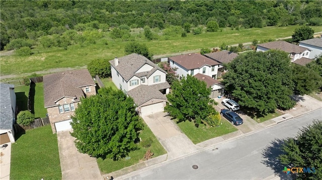 180 Beech Dr, Kyle, TX 78640 - aerial perspective of suburban area with a forest