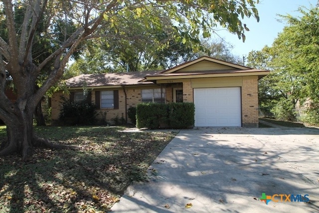 ranch-style home with a garage