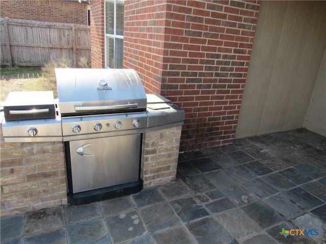 view of patio / terrace featuring a grill and area for grilling