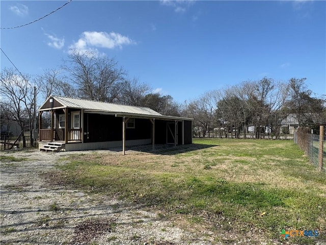 exterior space featuring a lawn