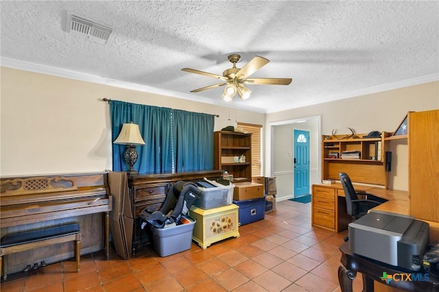 tiled office space with a textured ceiling, visible vents, a ceiling fan, and ornamental molding